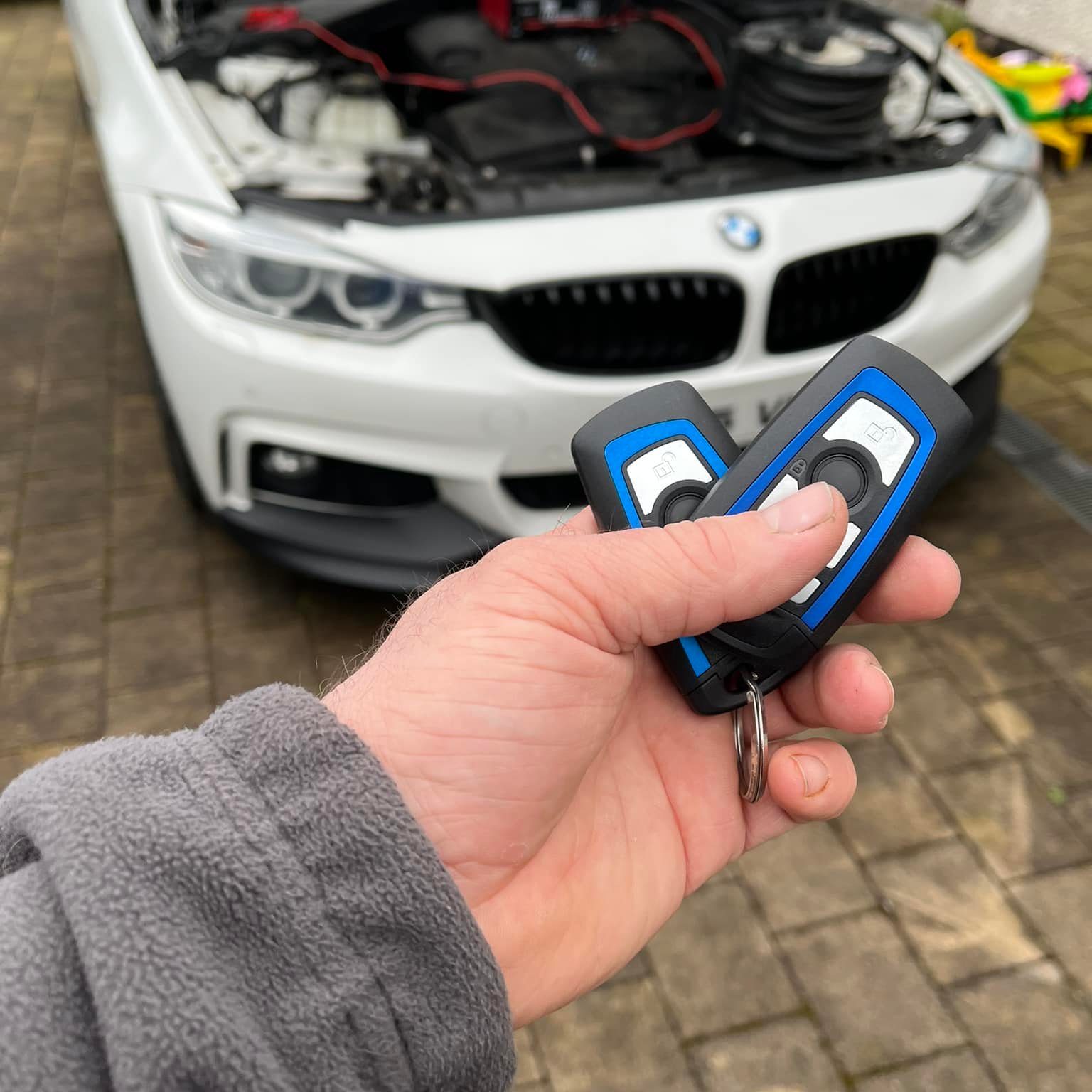 White BMW with two newly programmed keys